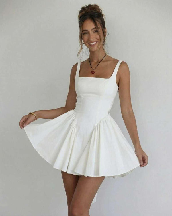 White square neck mini dress with wide straps and flared skirt for a wedding guest look