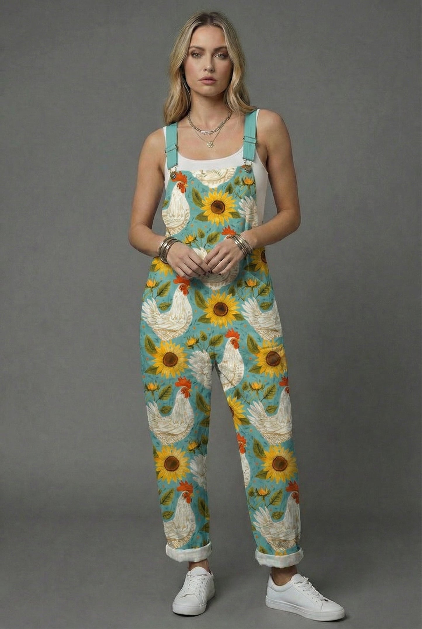 Women botanical print wide leg romper with turquoise chicken and sunflower pattern, sleeveless