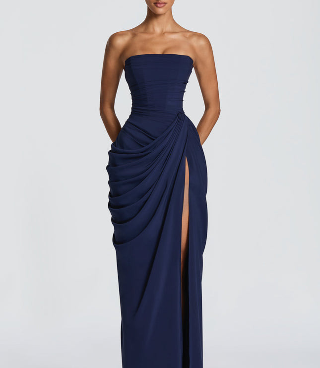 Full length navy strapless corset maxi womens dress with draped skirt panel and thigh split