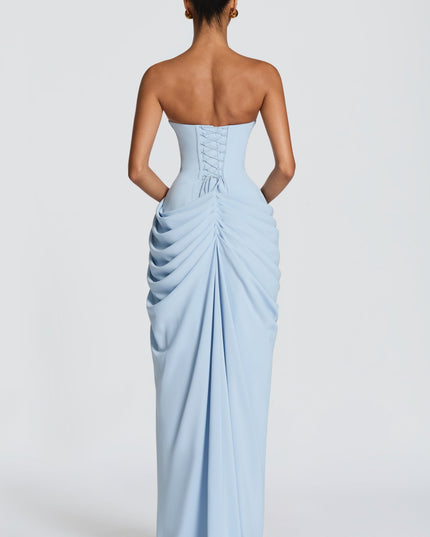 Back view light blue strapless corset maxi dress with lace-up detail and ruched skirt drape