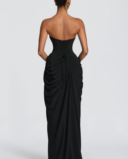 Black maxi dress with strapless corset bodice and high thigh split in front view