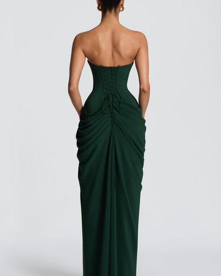 Dark green strapless corset maxi dress with high slit and fitted draped skirt