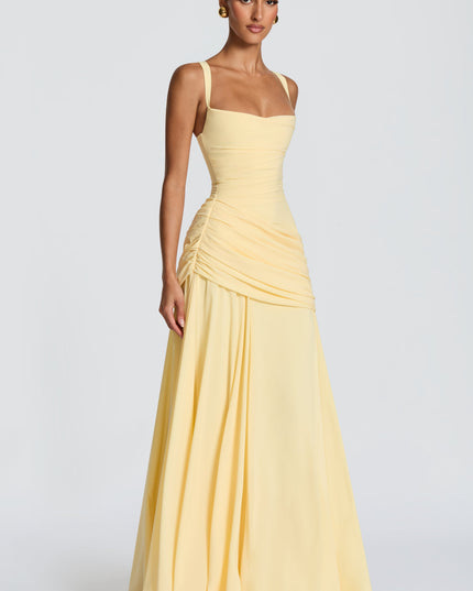Side angle butter yellow square neck womens dress with ruched hip and draped maxi skirt