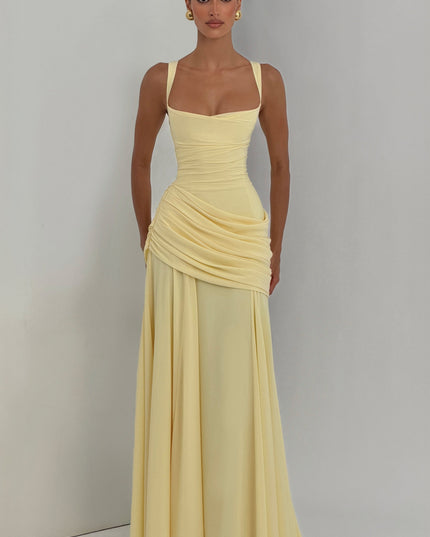 Butter yellow square neck maxi dress in natural lighting, ruched waist and flowing skirt front