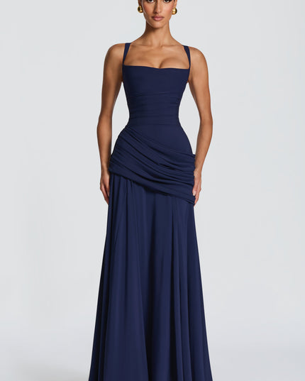 Navy blue square neck wedding guest maxi dress with ruched waist and draped skirt, front view