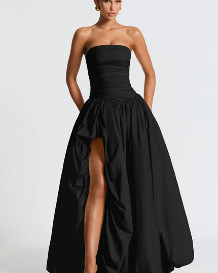 Black strapless high low maxi cocktail dress with ruched bodice and dramatic draped skirt