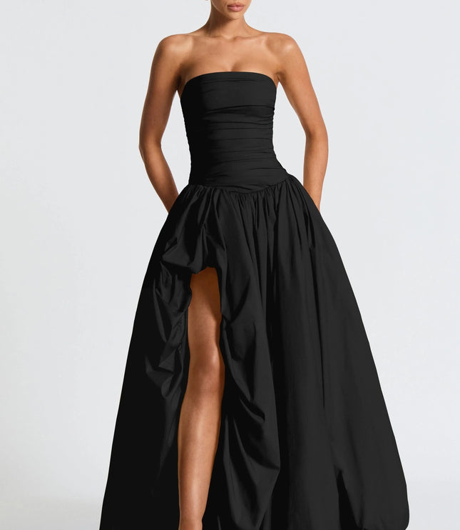 Black strapless high low maxi cocktail dress with ruched bodice and dramatic draped skirt