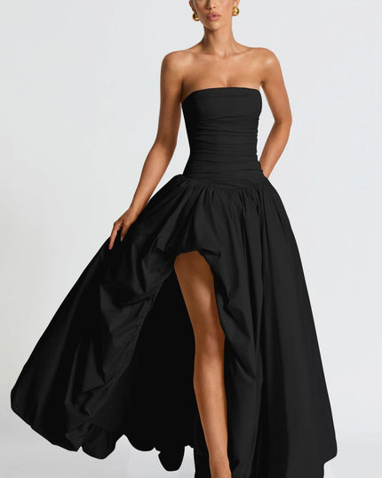 Front view black strapless high low maxi cocktail dress with fitted bodice and full skirt