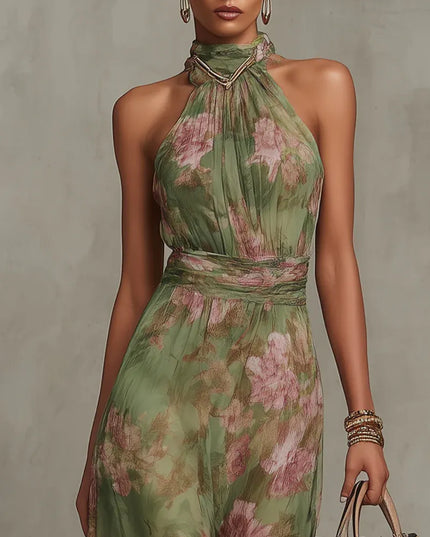 Women green floral maxi dress angled front view highlighting halter neck hardware detail and pleated bodice