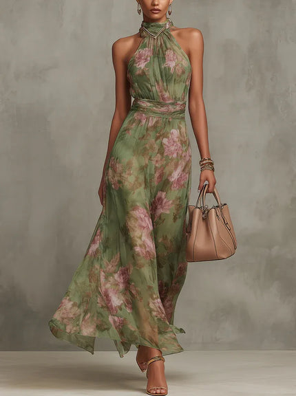 Women green floral maxi dress with halter neckline, gathered pleats, and ruched waistband front view