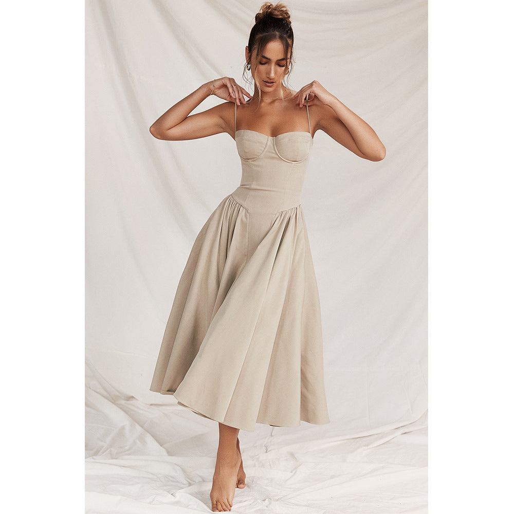 Beige cocktail midi dress with adjustable straps, fitted bodice, and full A-line skirt