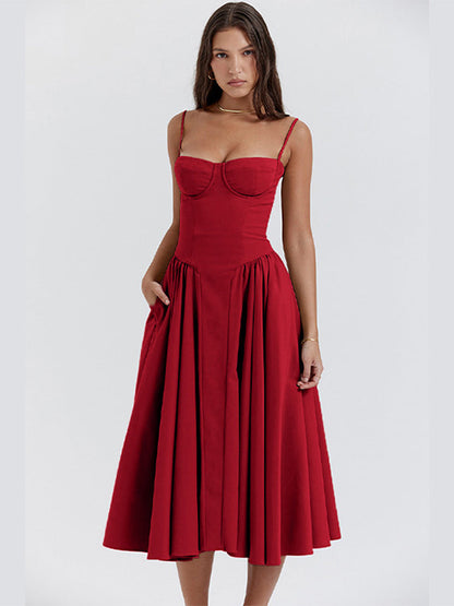 Red adjustable strap midi dress with structured bust, fitted waist, and midi-length skirt
