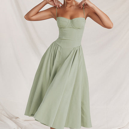 Light green cocktail midi dress with adjustable straps, corset bodice, and full skirt
