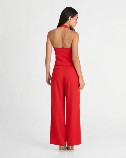 Back view of red halter wide leg pants set showing open back vest top and full-length trousers