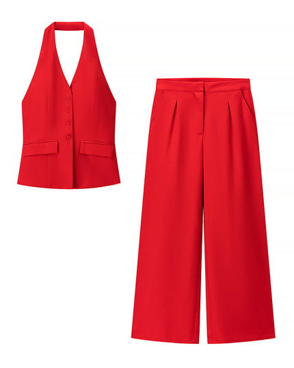 Two-piece red halter top and wide leg pants set laid flat on white background