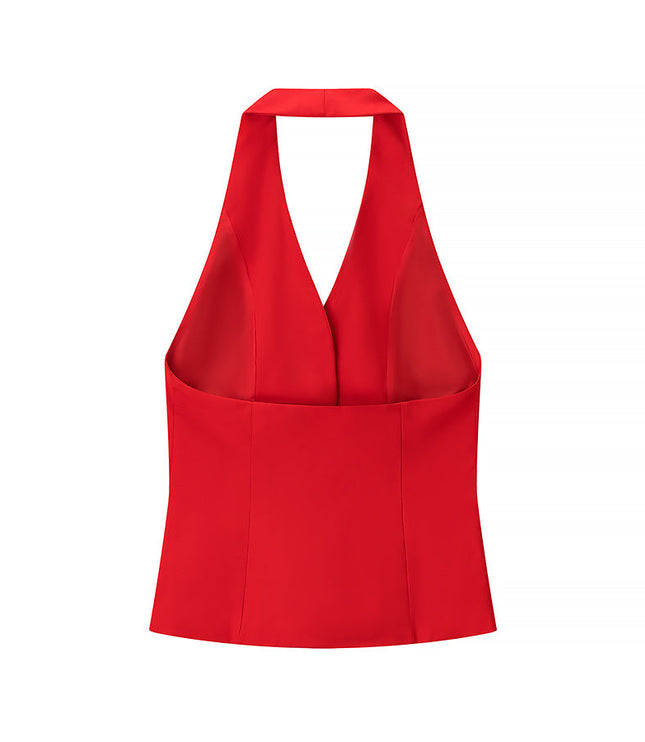 Back view of red halter vest top showing open-back design and fitted waist detail