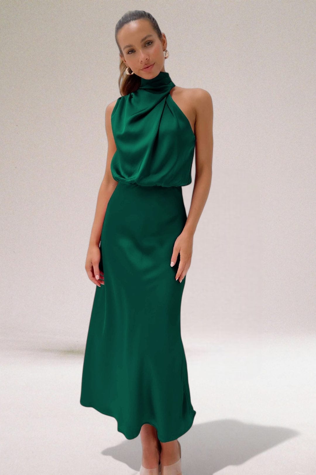 Emerald green halter midi dress with gathered satin bodice and skirt