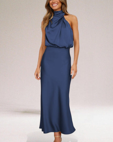 Blue halter midi dress with draped neckline and smooth fitted cocktail silhouette
