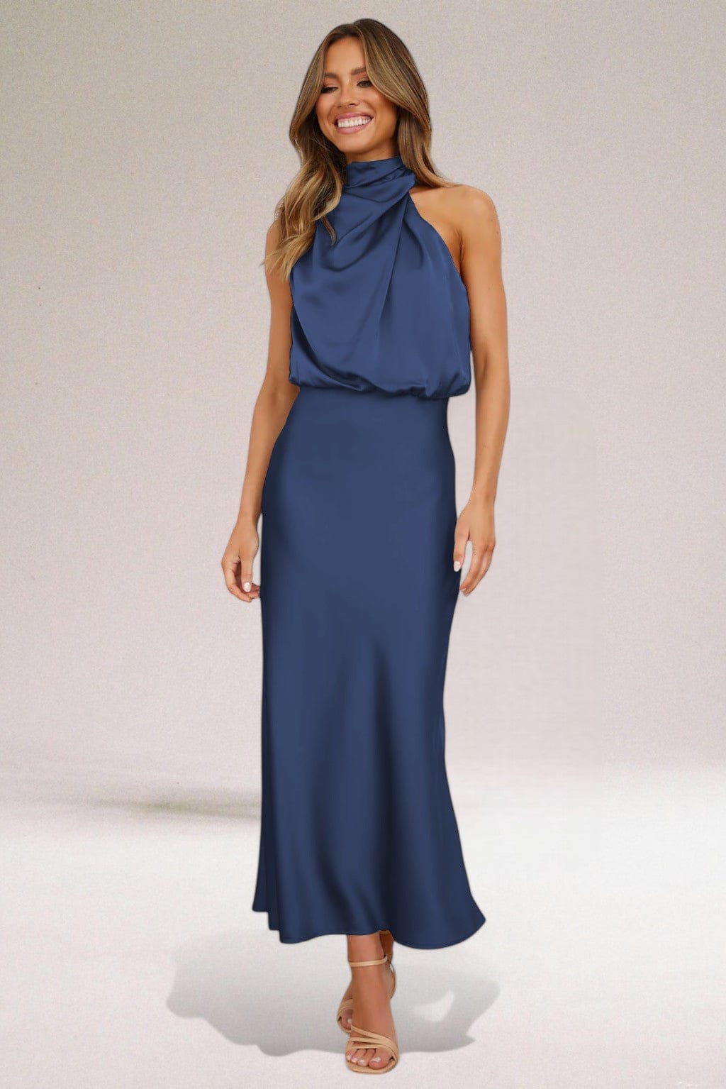 Blue halter midi dress with draped neckline and smooth fitted cocktail silhouette
