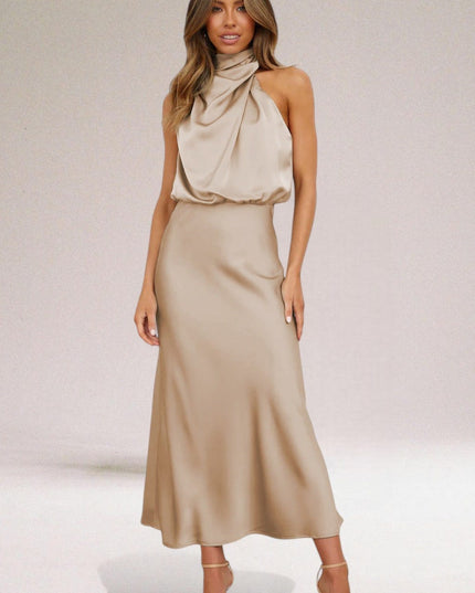 Champagne beige halter midi dress with soft draped satin bodice and elegant fit