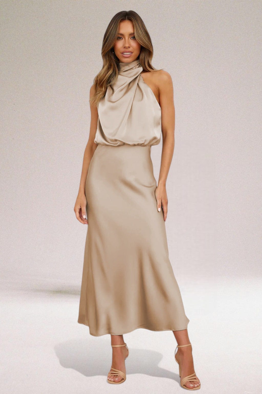 Champagne beige halter midi dress with soft draped satin bodice and elegant fit