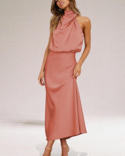 Coral halter midi dress with gathered neckline and flowing satin cocktail skirt