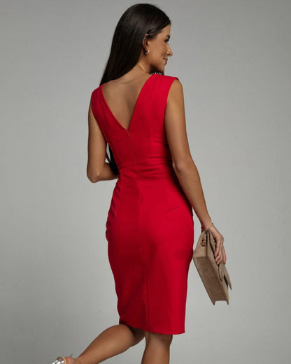 Back view of red sleeveless midi dress with deep V back and fitted cocktail silhouette
