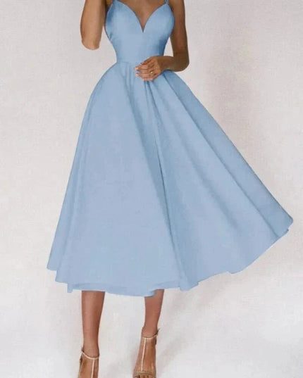 Front view of light blue wedding guest midi dress with V neck and full skirt