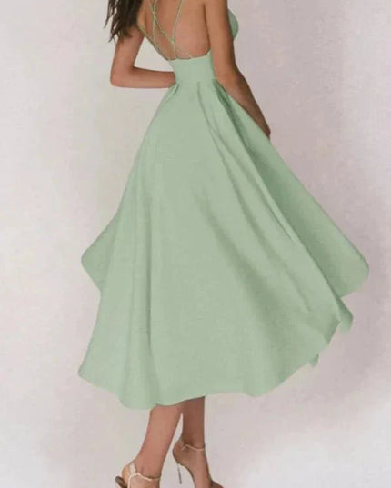 Mint green V neck open back midi dress with thin straps and flared skirt