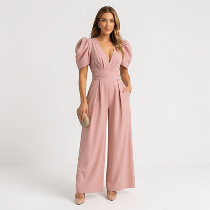 Pink wide leg jumpsuit with puff sleeves, deep V-neck, and cinched waist