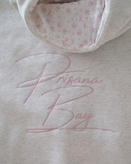 Women's Embroidered Bow Hoodie with a Floral-Lined Hood
