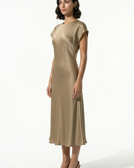 Side view of taupe satin midi dress with relaxed cap sleeves and midi hem