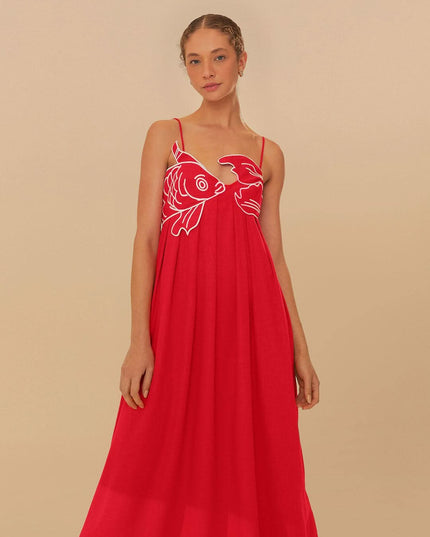 Front view of red fish print maxi dress with V neckline and relaxed summer style