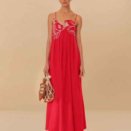 Red fish print maxi dress with spaghetti straps and flowing summer silhouette