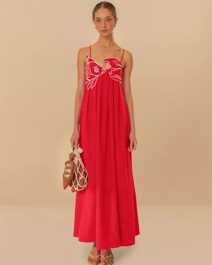Red fish print maxi dress with spaghetti straps and flowing summer silhouette