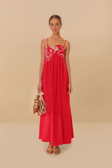 Red fish print maxi dress with spaghetti straps and flowing summer silhouette