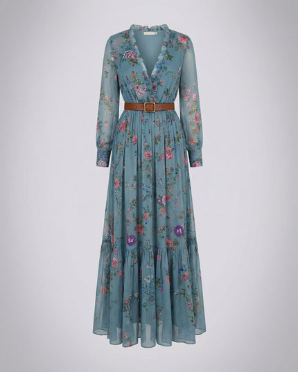 Blue floral V-neck maxi dress with ruffle neckline, long sleeves, and brown buckle belt
