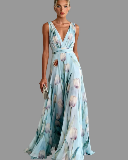 Light blue floral sleeveless maxi dress with deep V-neck and waist tie, flowing skirt