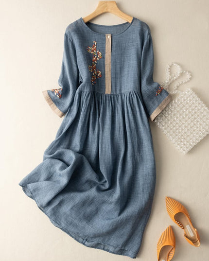 Blue women's summer embroidered midi dress with gathered waist and floral sleeve accents