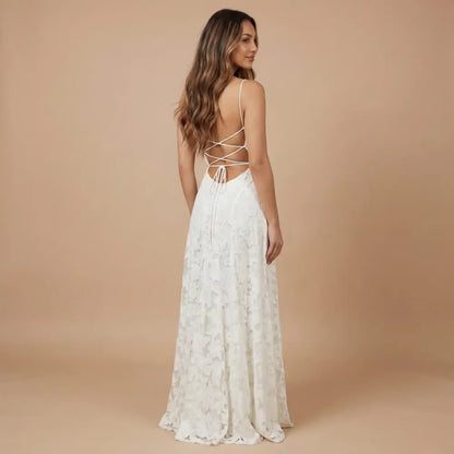 Back view of ivory lace maxi dress with crisscross lace-up back detail