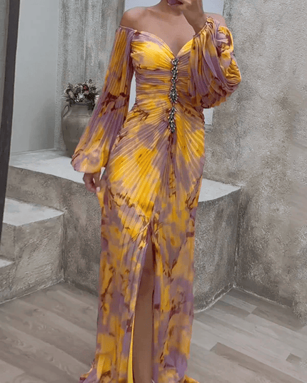 Front view of women's floral off shoulder maxi dress with embellished center and slit