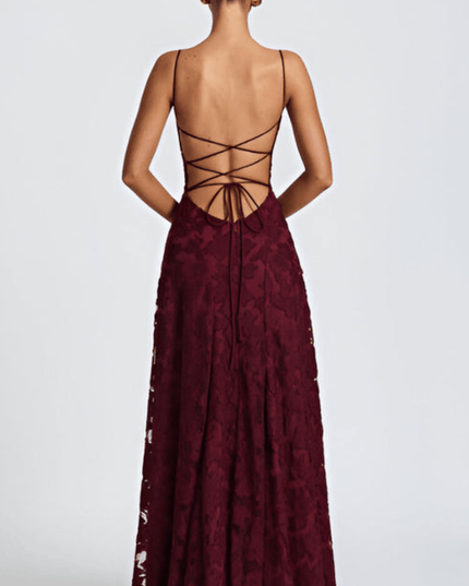 Back view of burgundy floral maxi dress with open back and crisscross tie straps