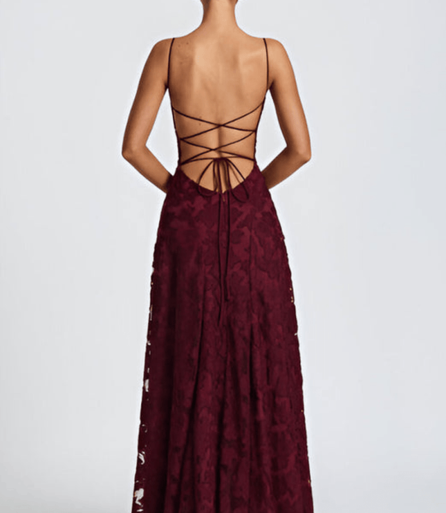 Back view of burgundy floral maxi dress with open back and crisscross tie straps