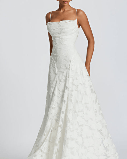 White floral sleeveless maxi dress with fitted waist and straps, front view