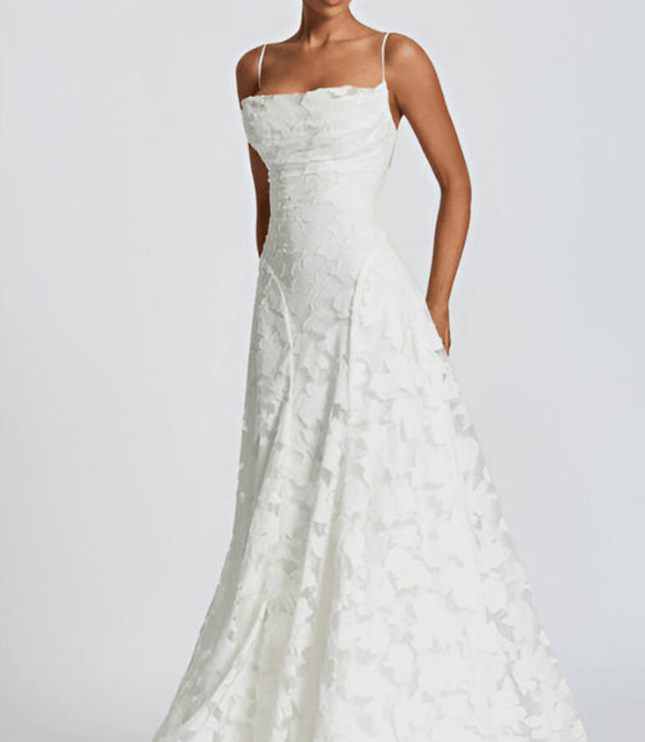 White floral sleeveless maxi dress with fitted waist and straps, front view