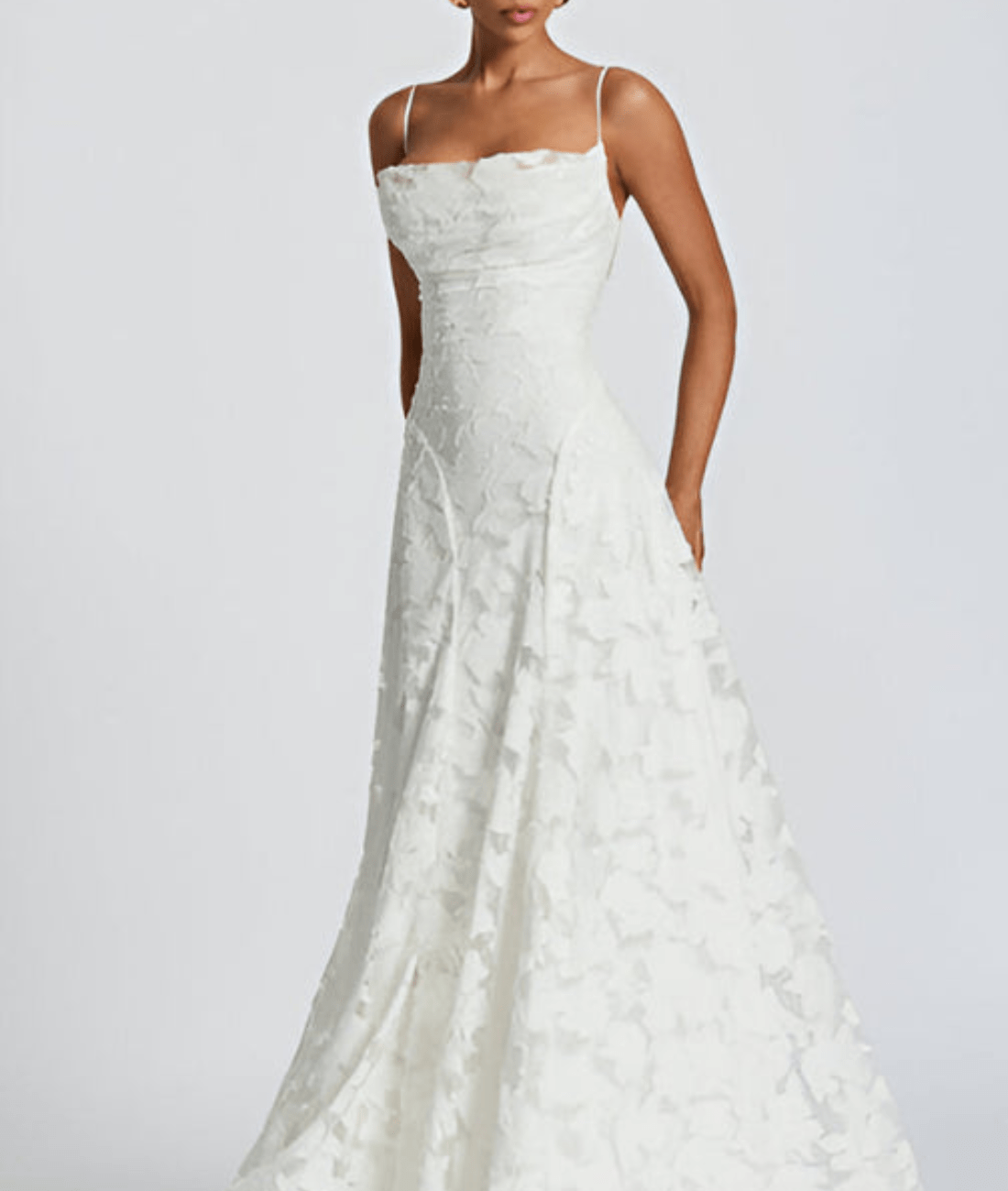 White floral sleeveless maxi dress with fitted waist and straps, front view