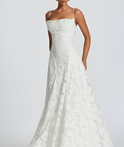 White floral sleeveless maxi dress with fitted waist and straps, front view