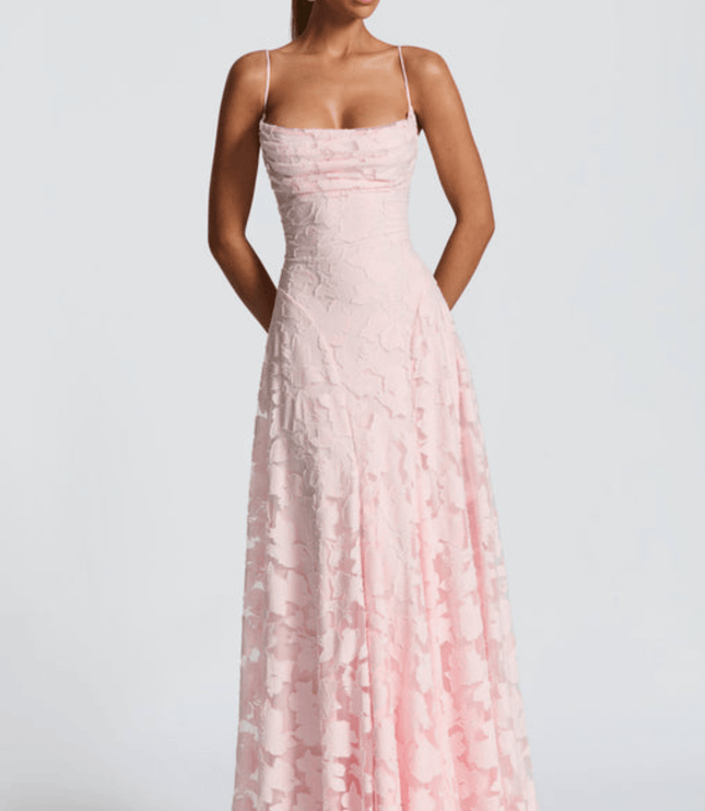 Light pink floral sleeveless maxi dress with fitted bodice and flowing skirt, front view