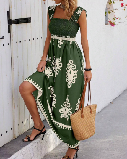 Green bohemian floral maxi dress with cream print, square neck and smocked waist