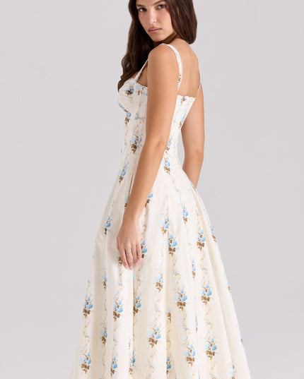 Front view of cream floral midi dress with sweetheart neckline, tie detail, and pockets